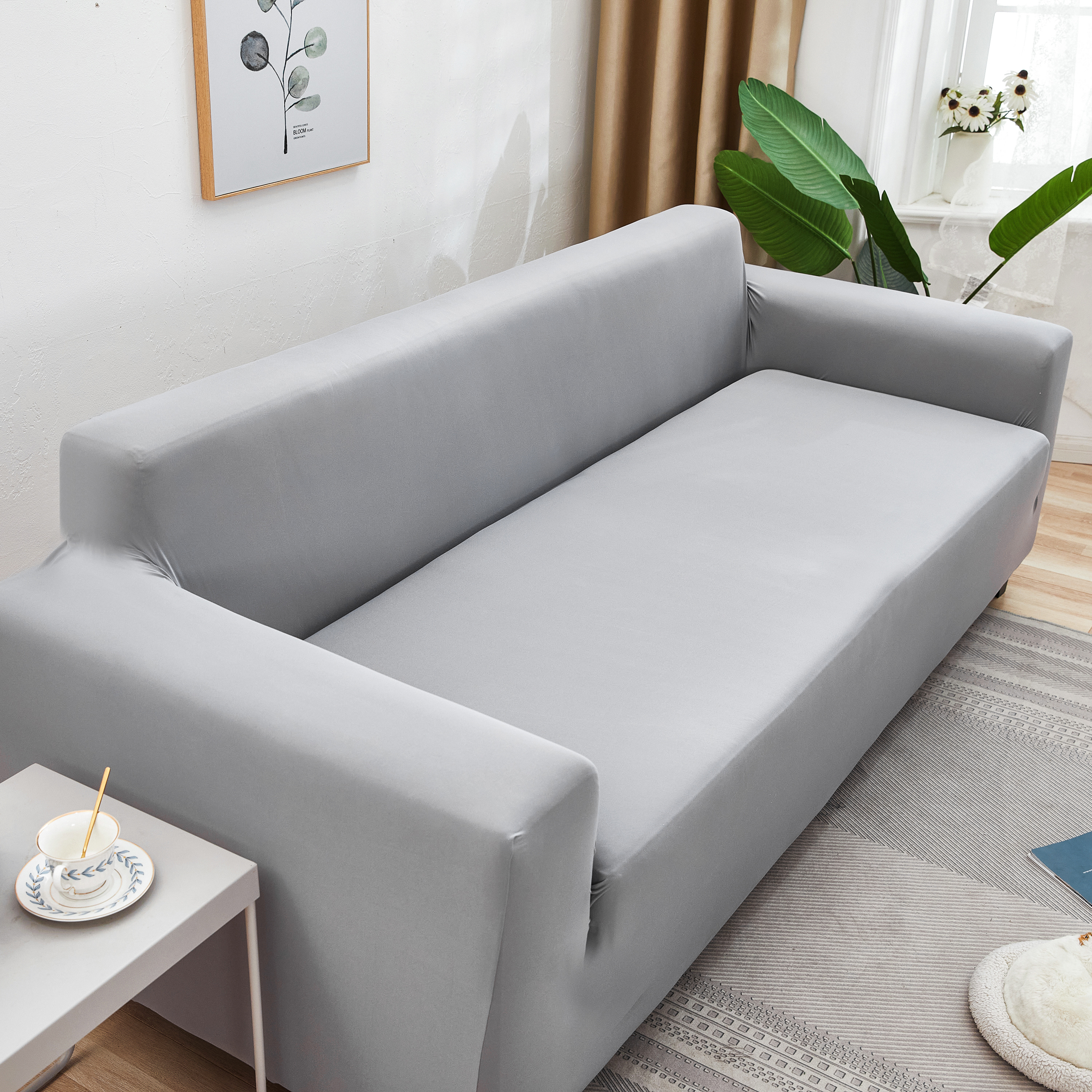 Divano elastico grigio in microfibra grigio