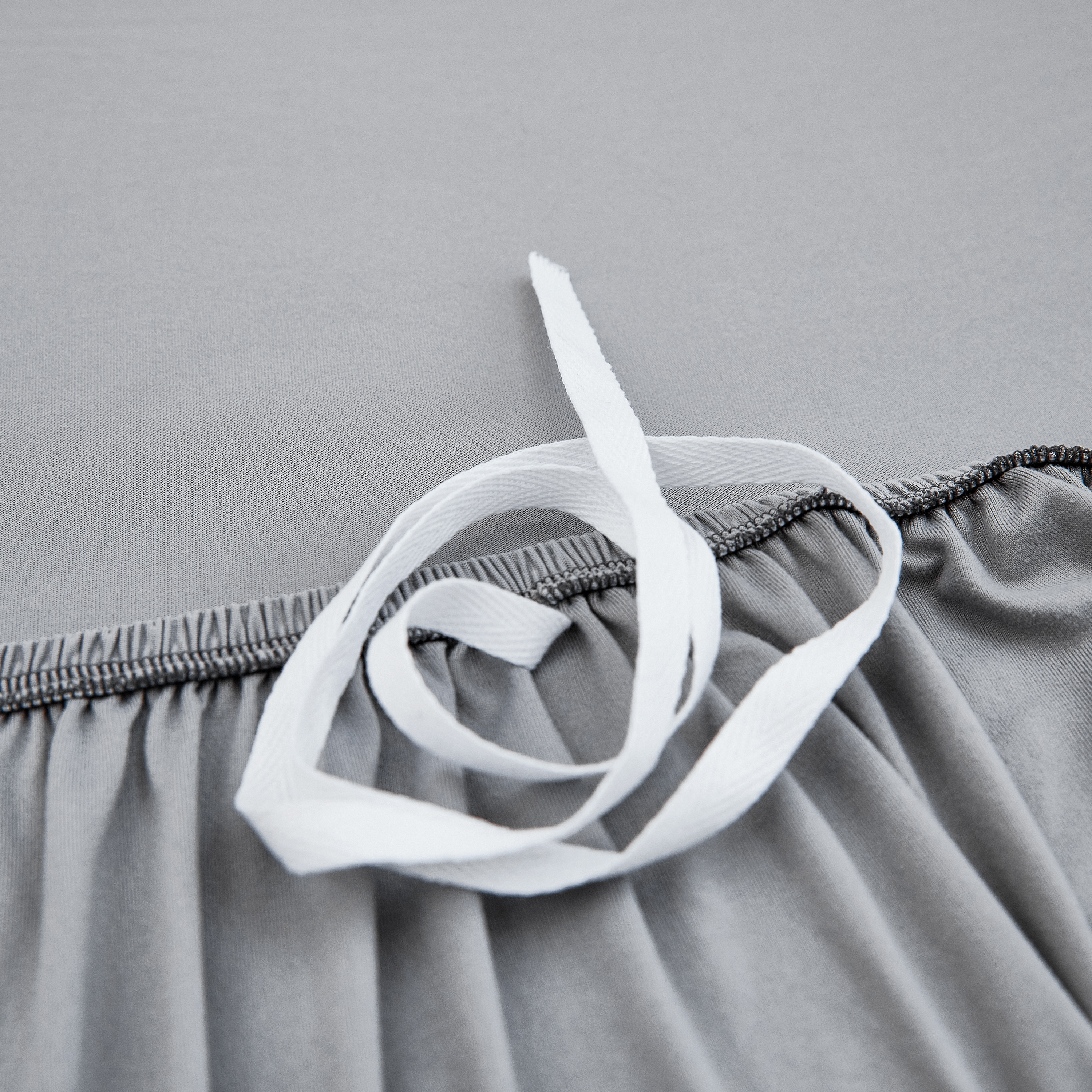 Divano elastico grigio in microfibra grigio